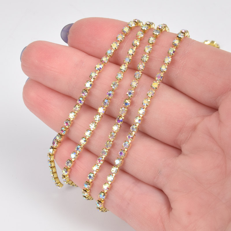 Стразовая цепь SS8 (2,4 мм), Золото, Стразы стеклянные белые АВ (ZEP-061013)