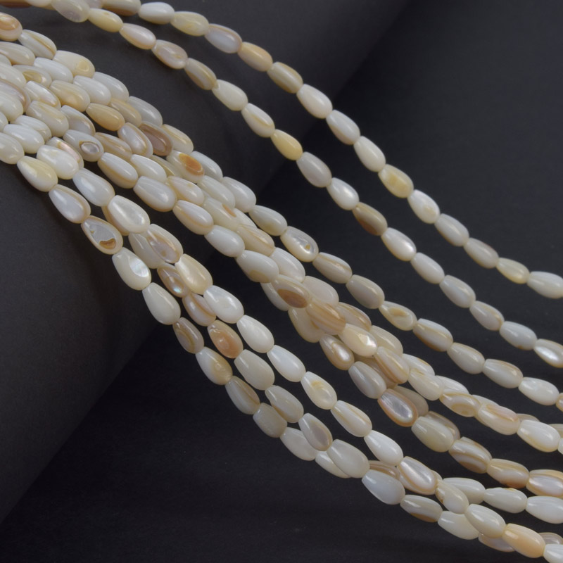 Намистини Перламутр бежевий, Натур. камінь, 5х3 мм, Крапля (BUS-058131)